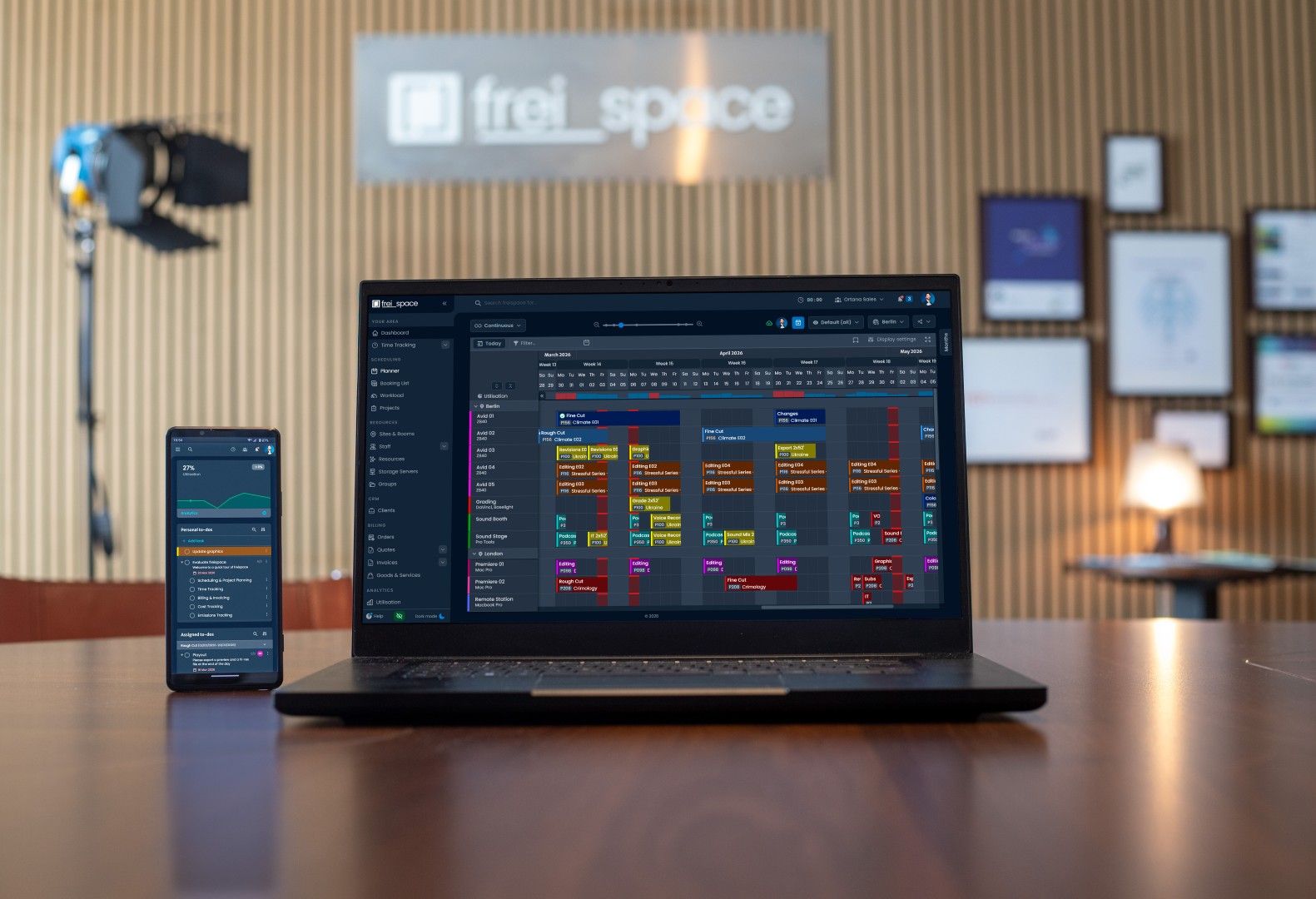 freispace dashboard on a mobile phone and freispace planner on a laptop